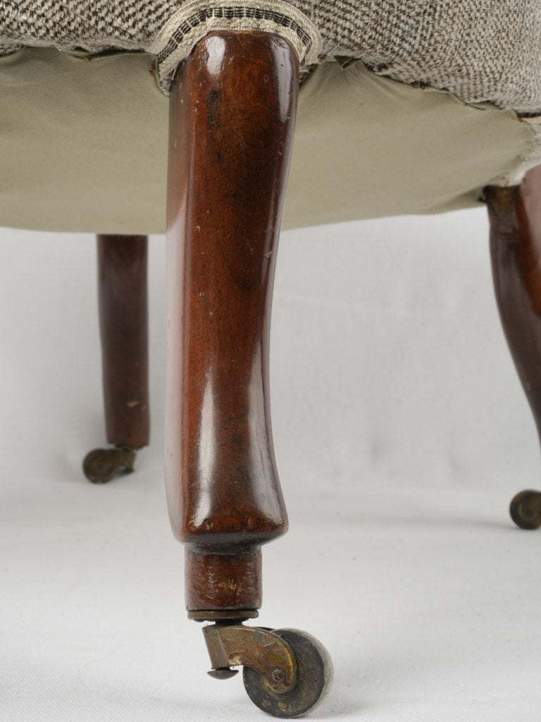 Classic mahogany rolling armchair