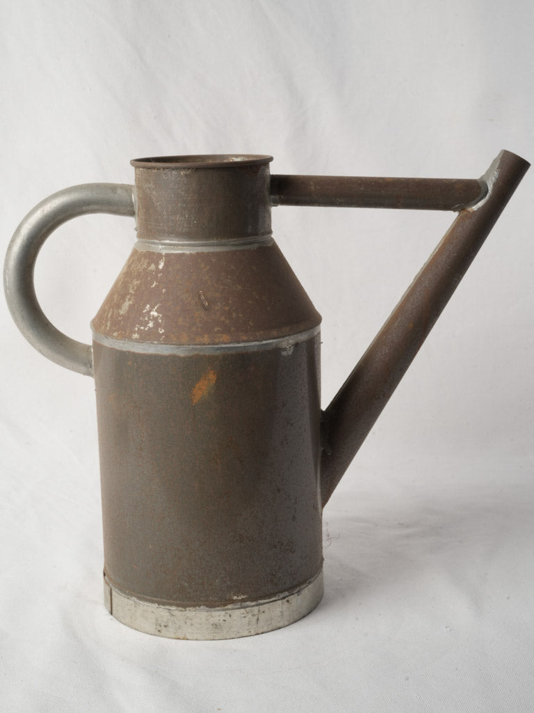 Vintage tin watering can