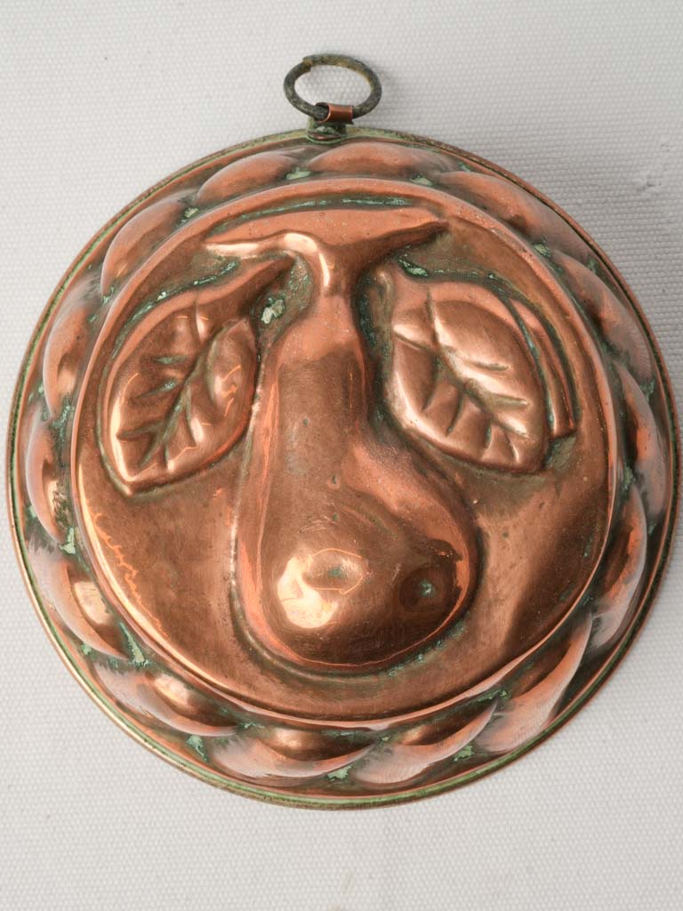Charming antique copper pear motif