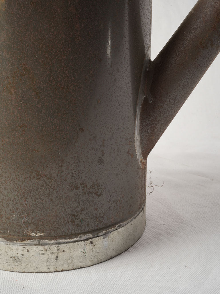 Hand-soldered tinplate watering can