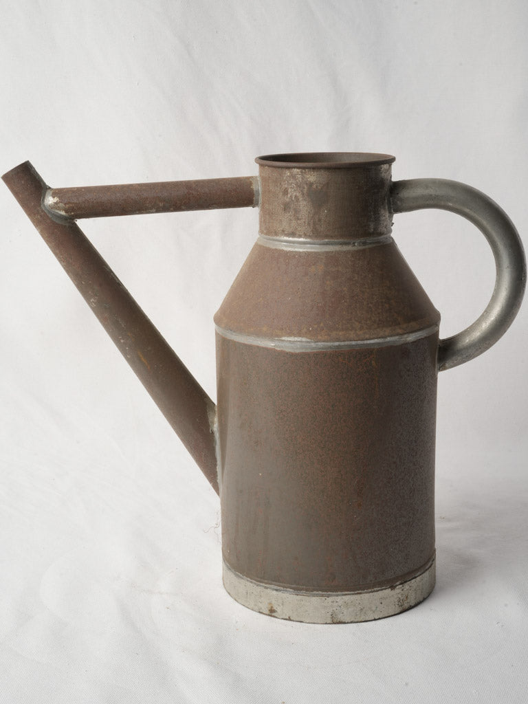 Rustic antique watering can