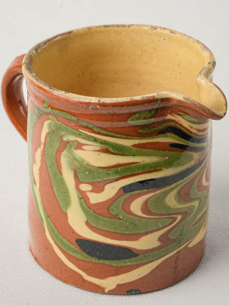 Colorful European earthenware creamer