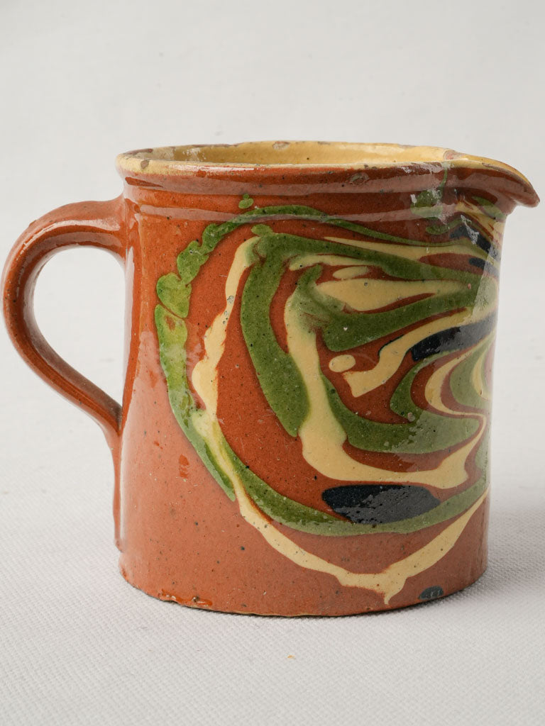 Petite ocher earthenware creamer