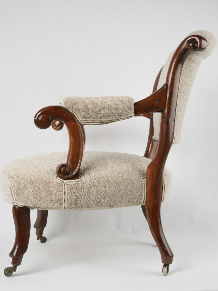 Vintage rolling armchair