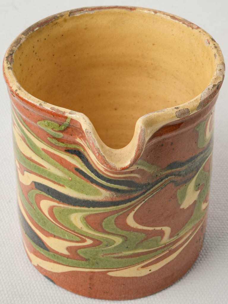 Distinctive multicolor glazed creamer