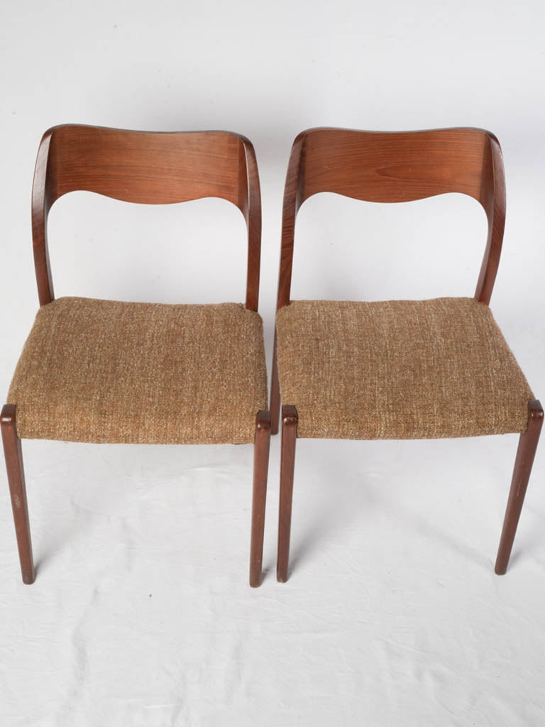 Warm-toned wood dining chairs