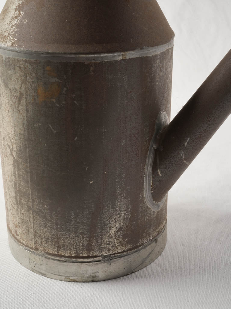 Aged oxidized conical spout vessel