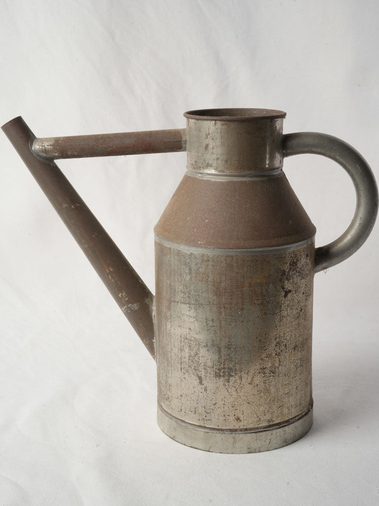 Timeworn vertical handle garden item