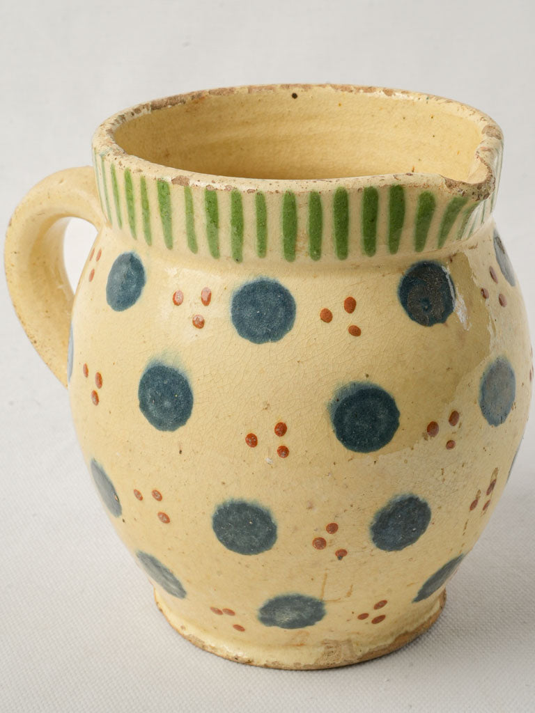 Rustic whimsical yellow-striped pitcher
