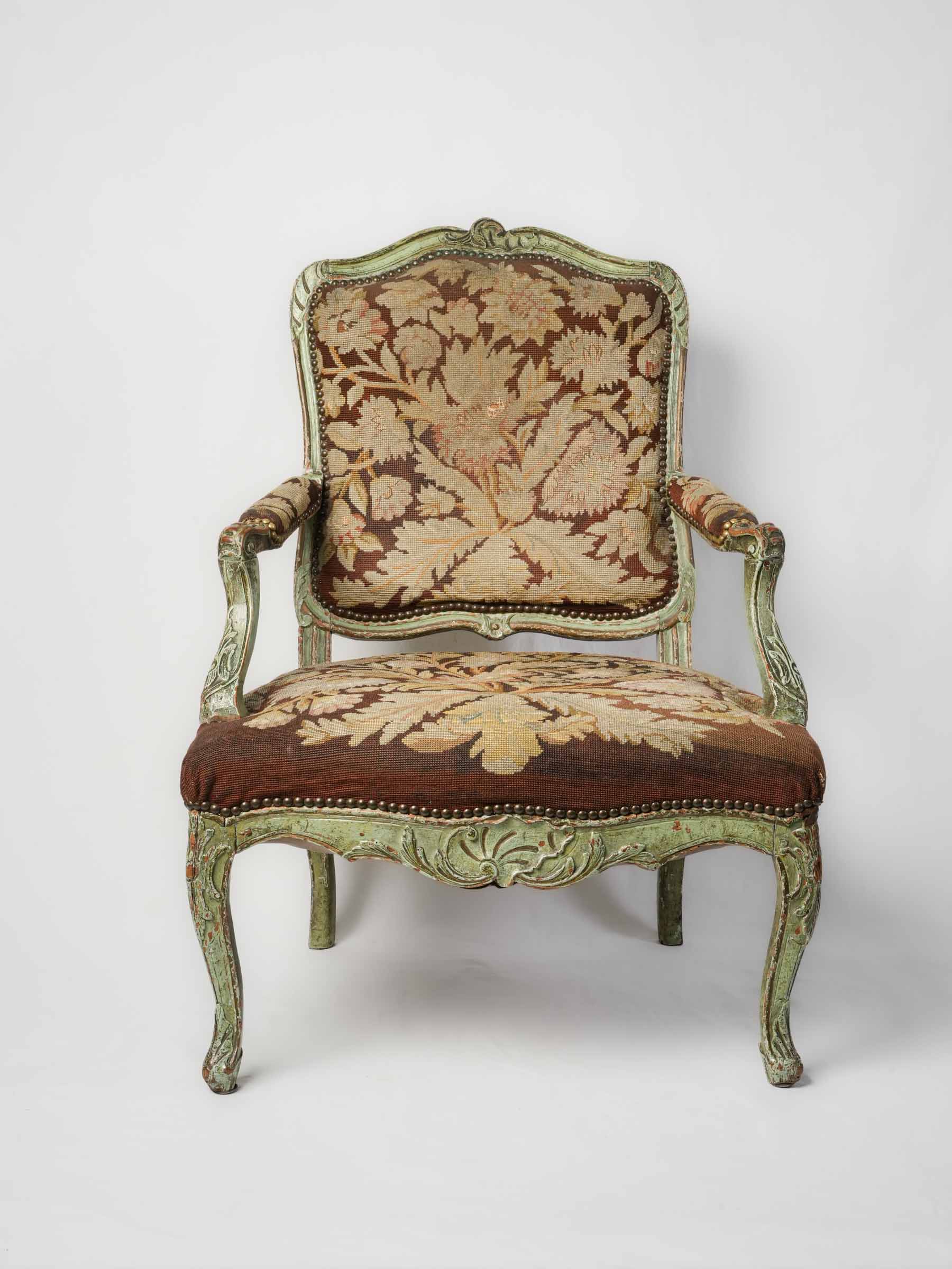 Distressed green-painted armchair