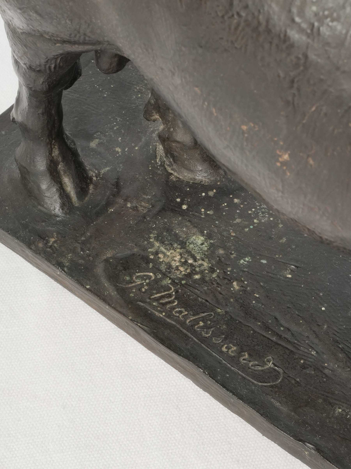 Intricately textured bronze bull statue