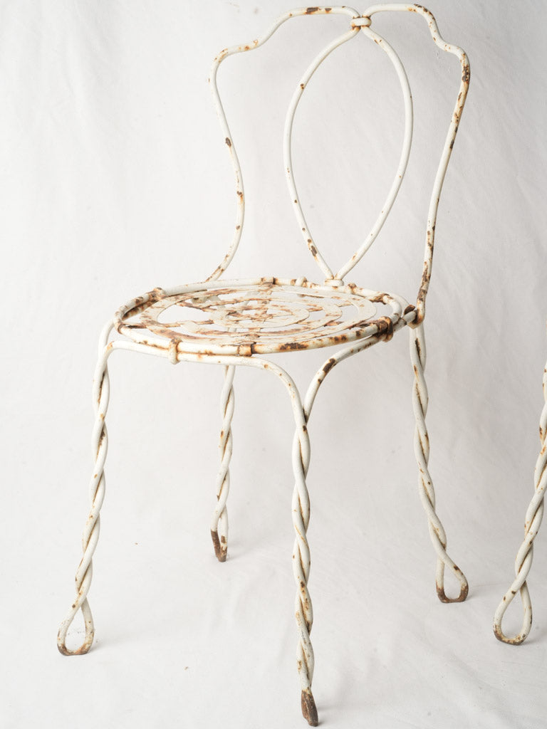Pair of late 19th century French wrought iron garden chairs