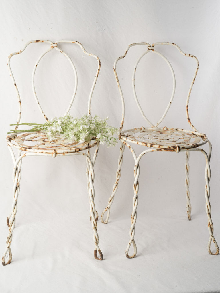 Pair of late 19th century French wrought iron garden chairs