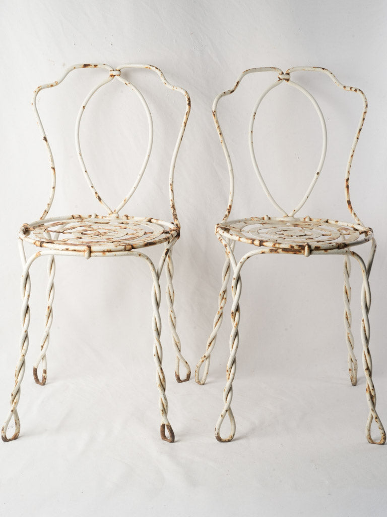 Pair of late 19th century French wrought iron garden chairs