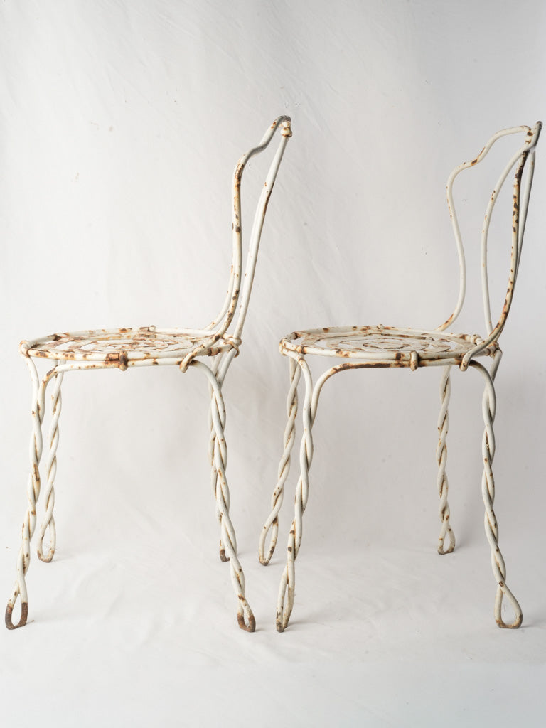 Pair of late 19th century French wrought iron garden chairs