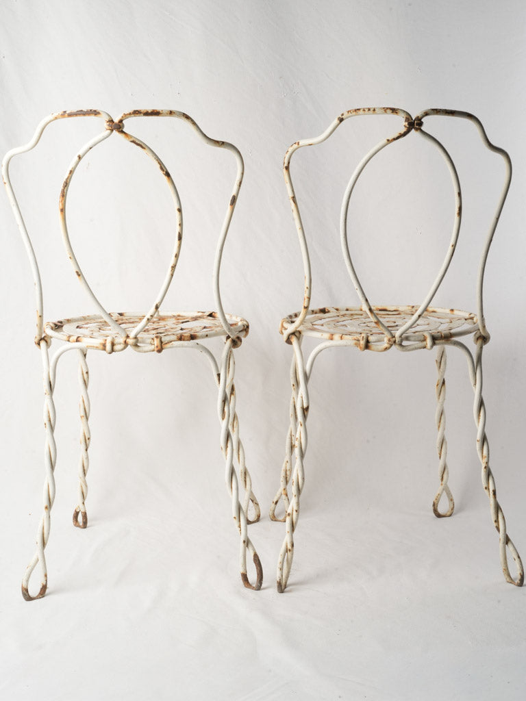 Pair of late 19th century French wrought iron garden chairs