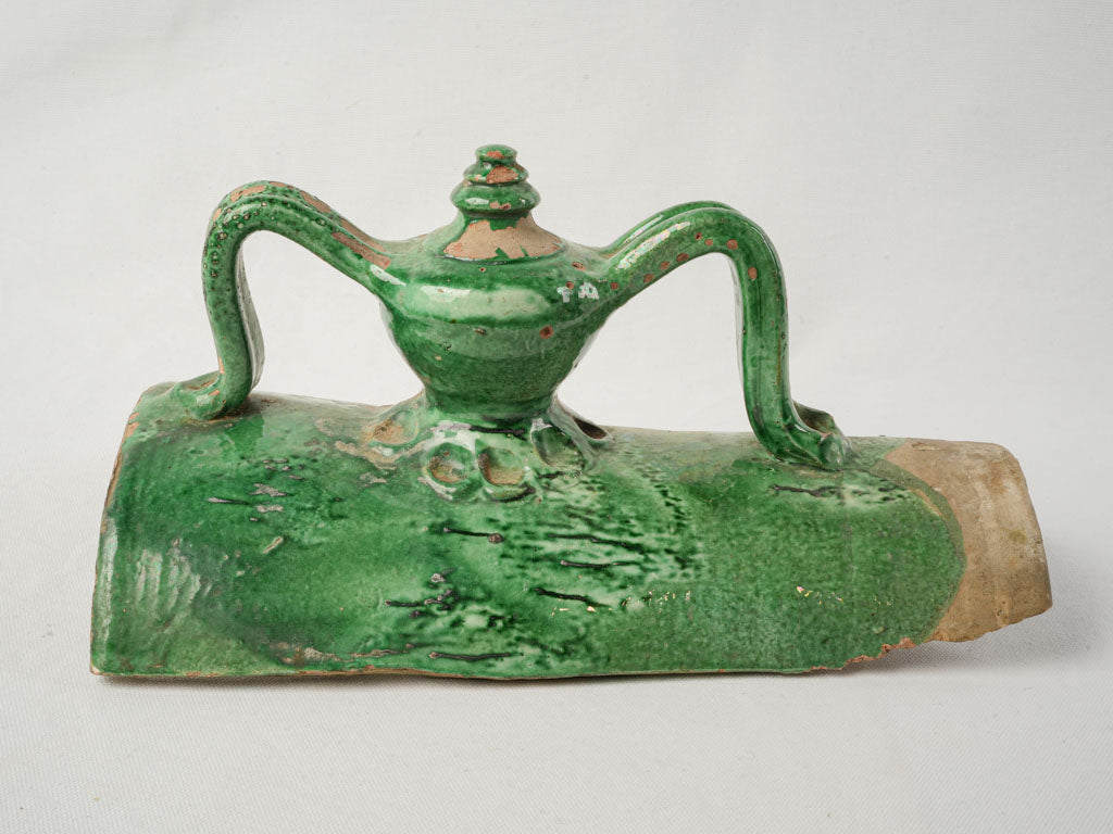 Rare dual-handled green ceramic tile