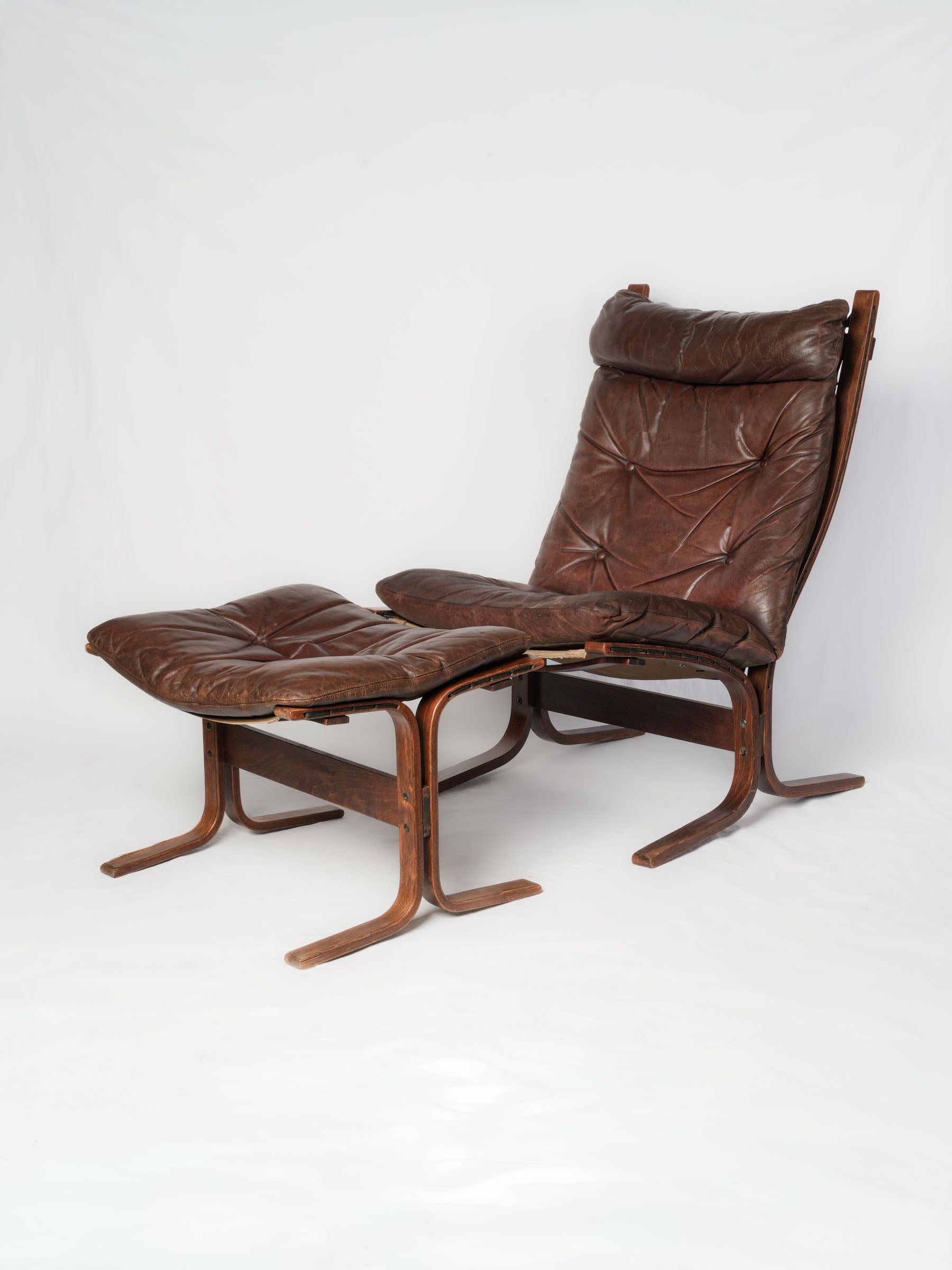 Elegant Norwegian leather armchairs