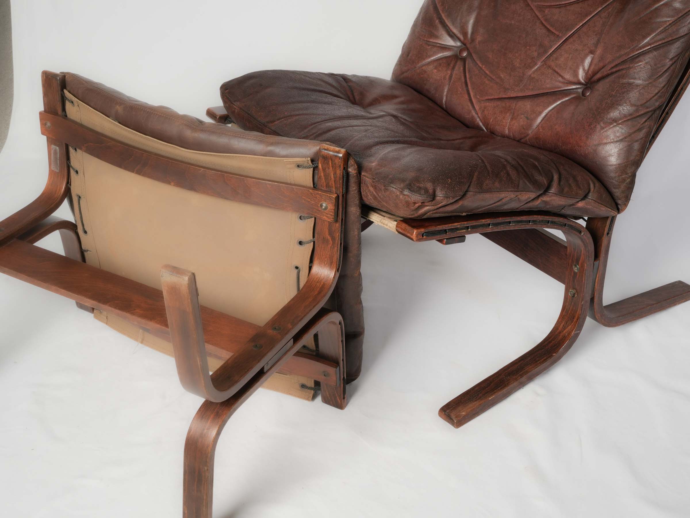 Light, airy modernist armchair set