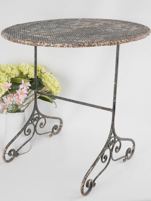 Antique perforated metal garden table