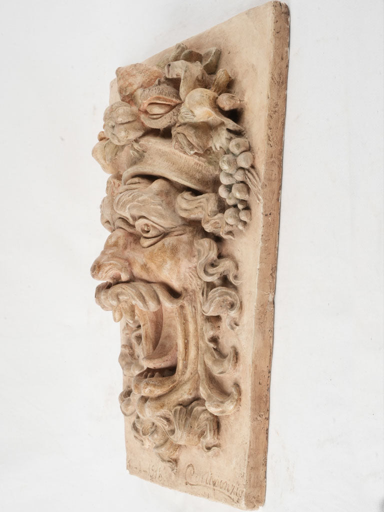 Rustic Roman-themed plaster artwork