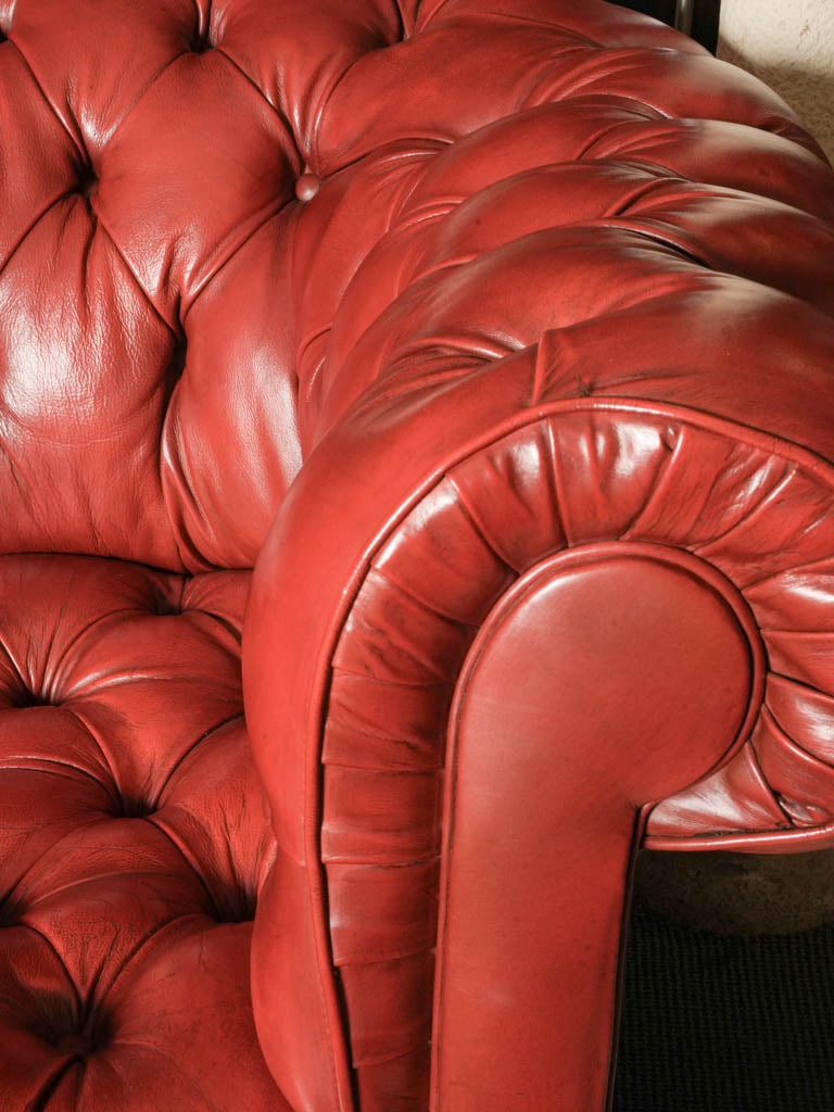 Elegant rolled-arm Chesterfield sofa