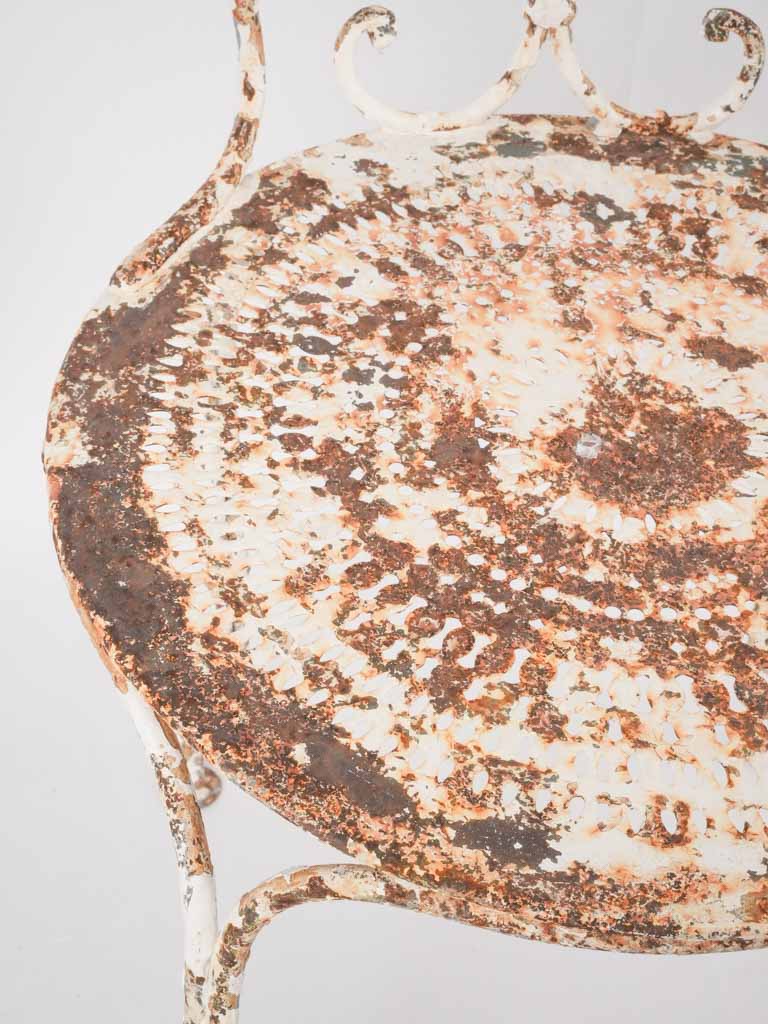 Timeless decorative ironwork patio chairs