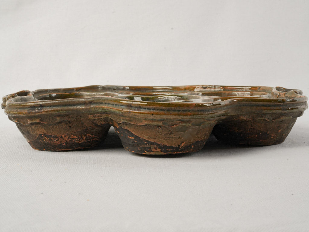 Distinctive Provence terracotta cookware.