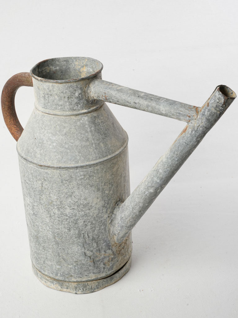 Historic galvanized metal watering can