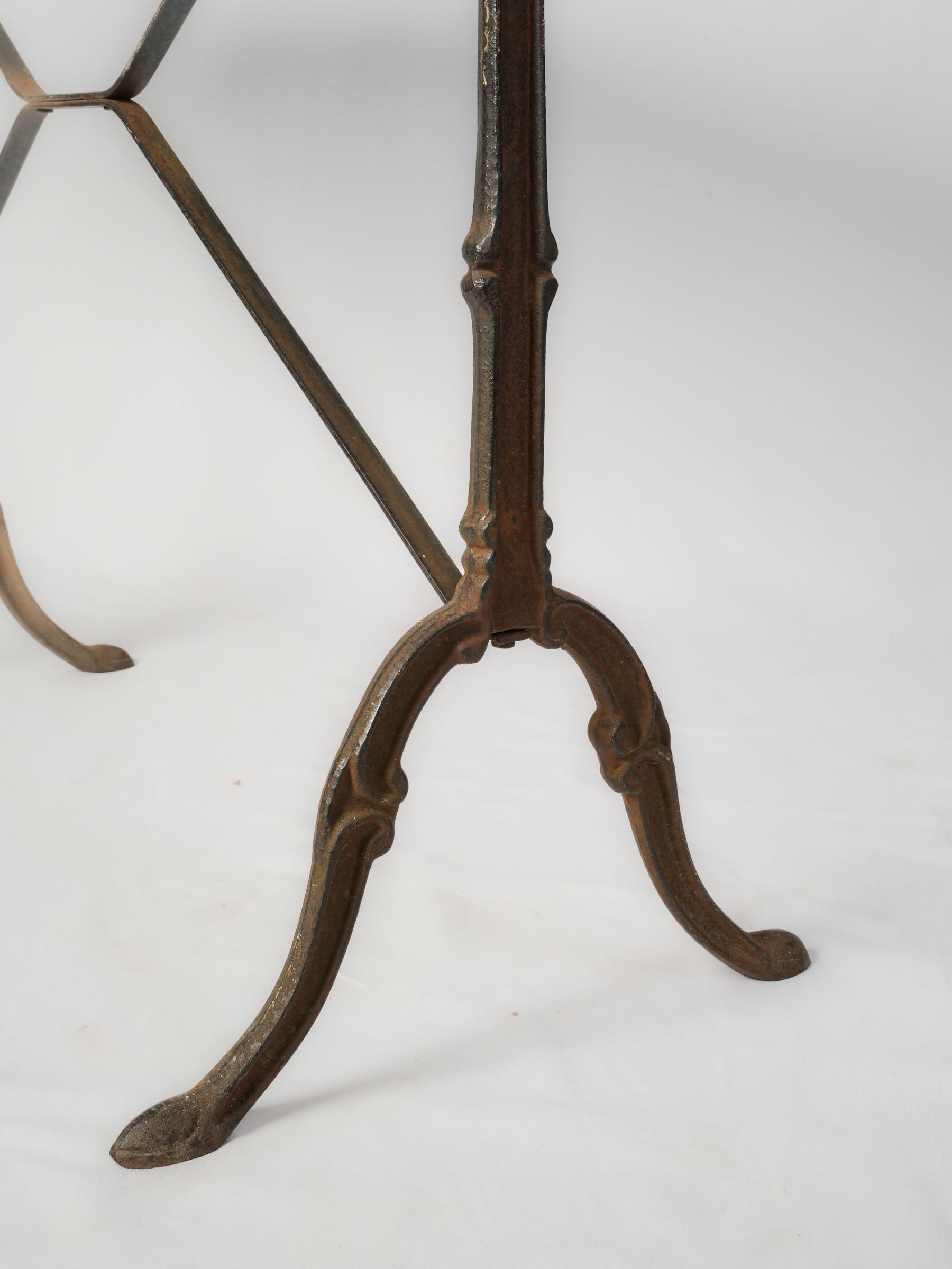 Durable graceful-lines iron table