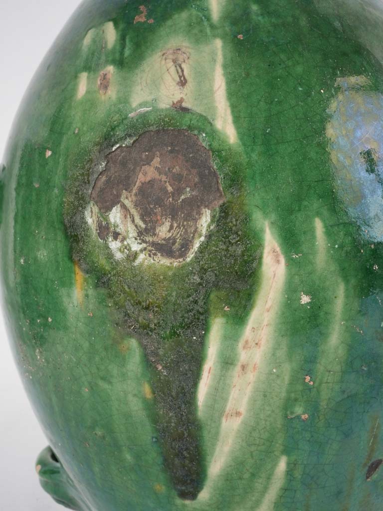 Charming yellow-glazed priest blessing jug