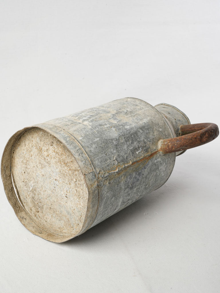 Nostalgic early 20th-century watering can