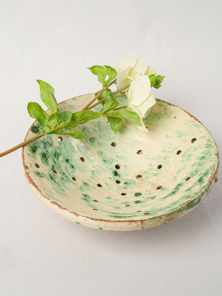 Rustic yellow-green perforated bowl