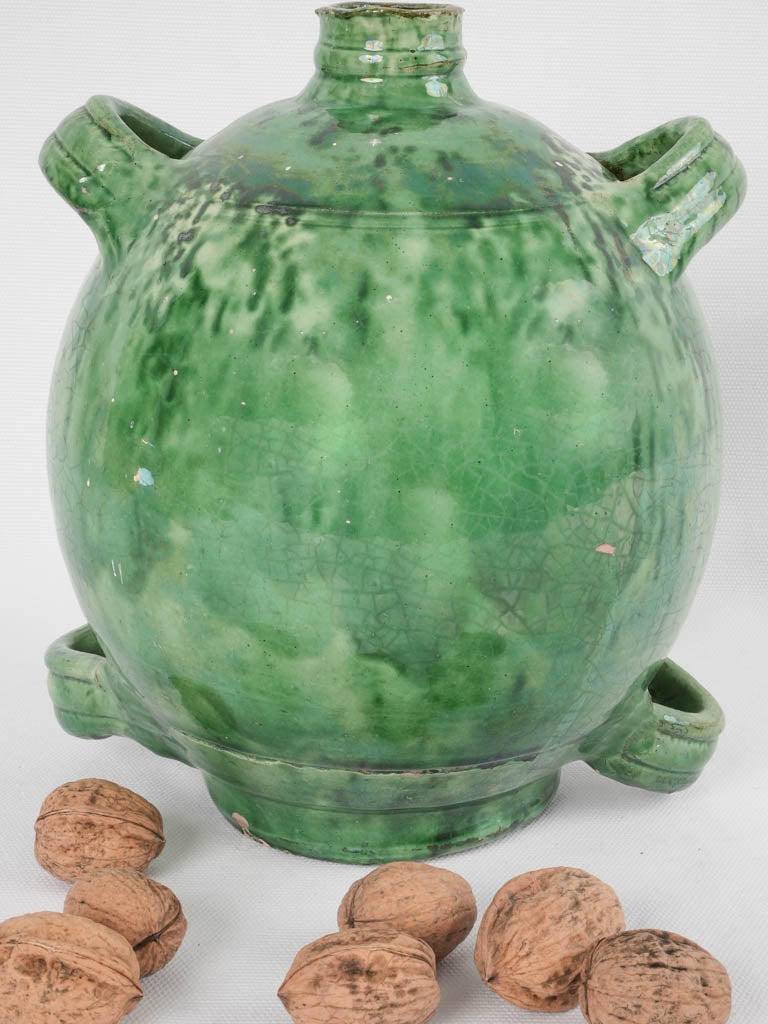 Antique French green conscience jug