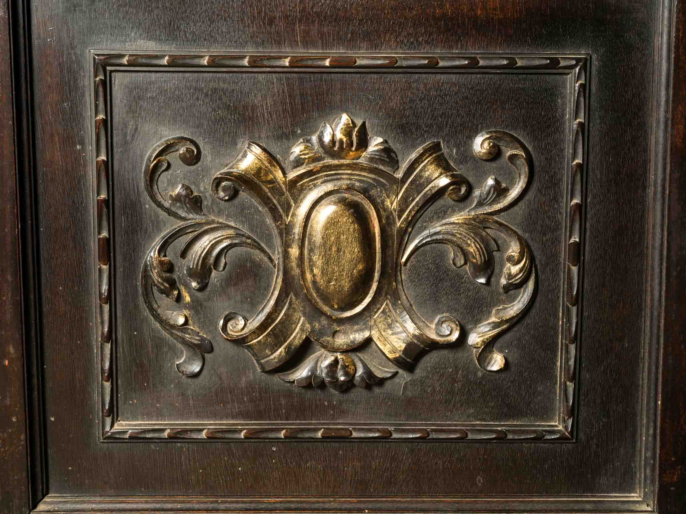 Sculpted columns antique bookcase