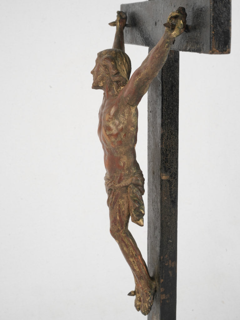 Serene gilded crucifix sculpture