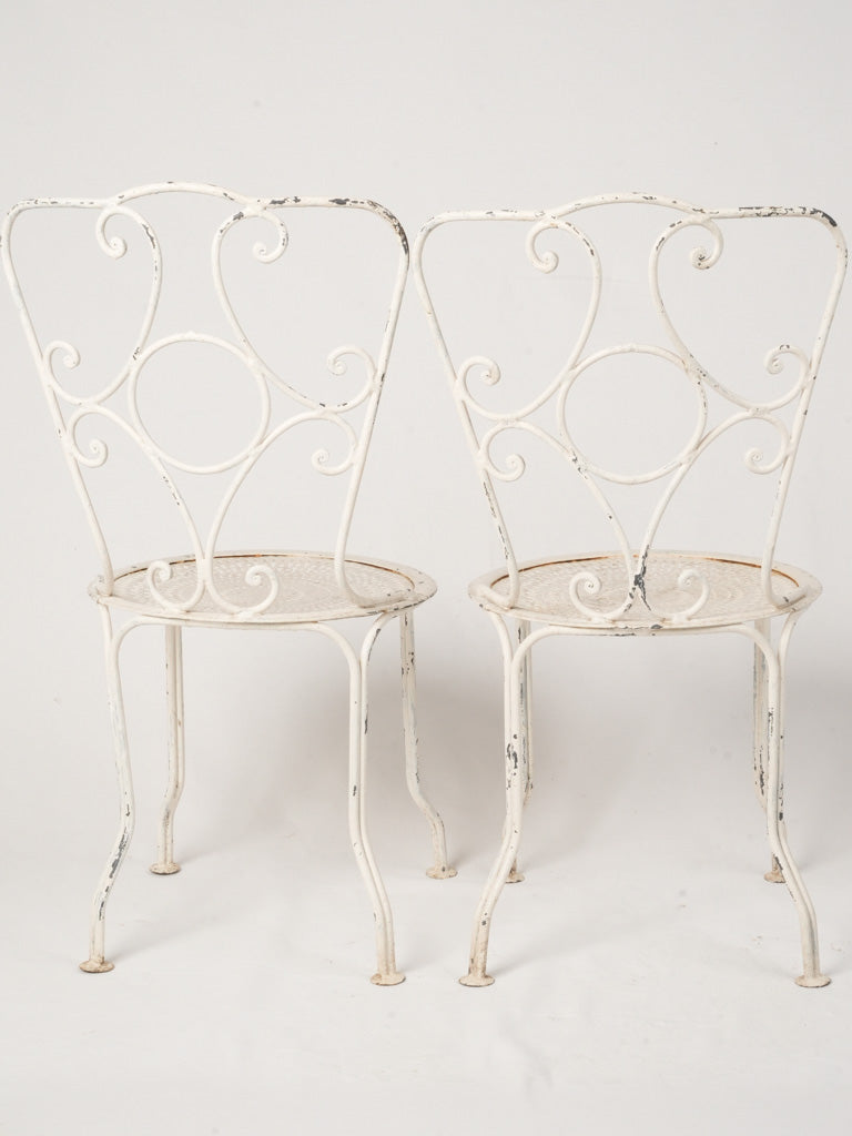 Delicate Antique Scrollwork Terrace Chairs