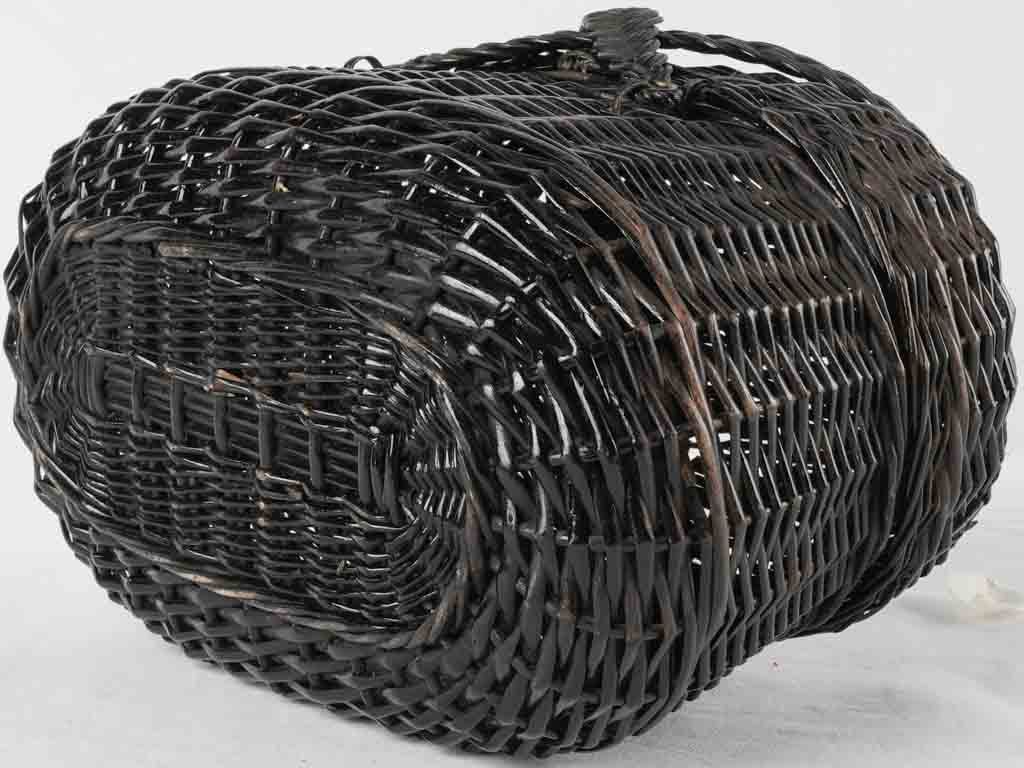 Classical black wicker costume basket