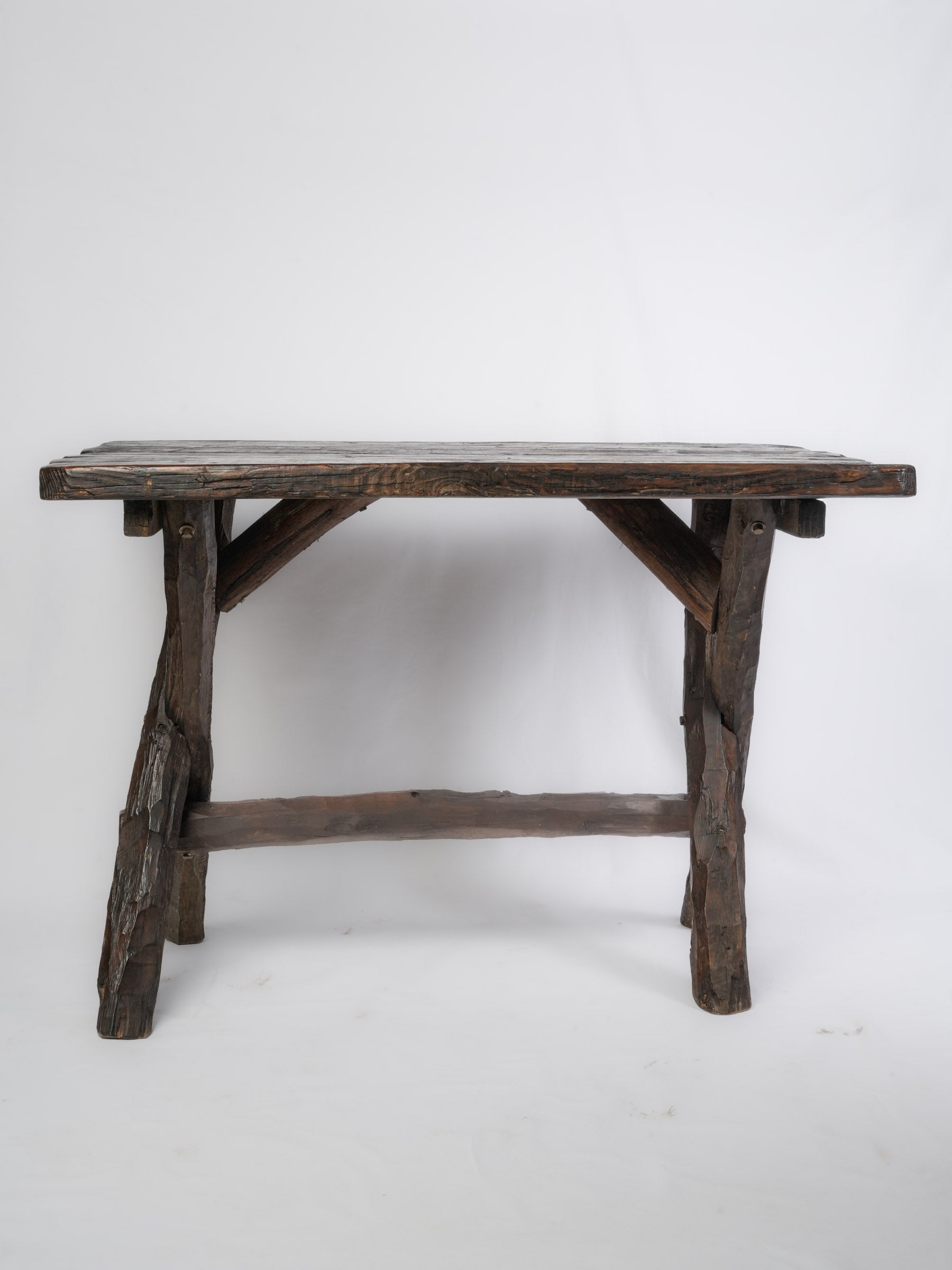Deeply weathered folk art consoles