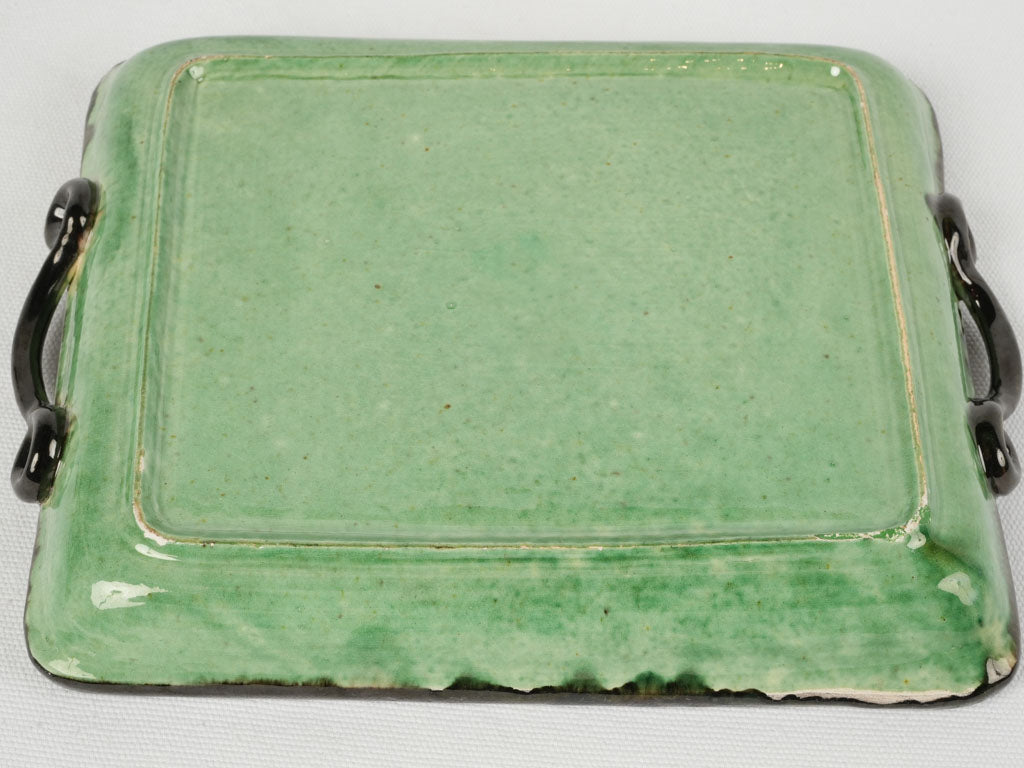 Old-world, handmade emerald green serving dish