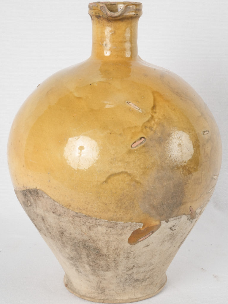 Historical French ceramic collectible yellow pitcher