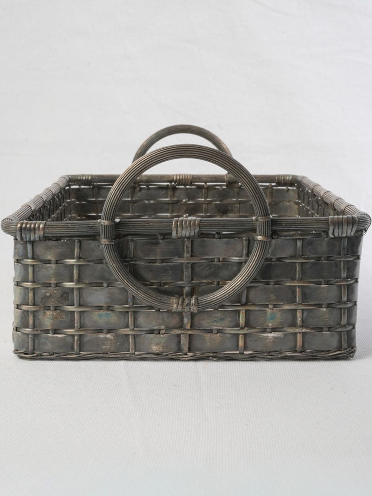 Mid-century style pewter tone basket.