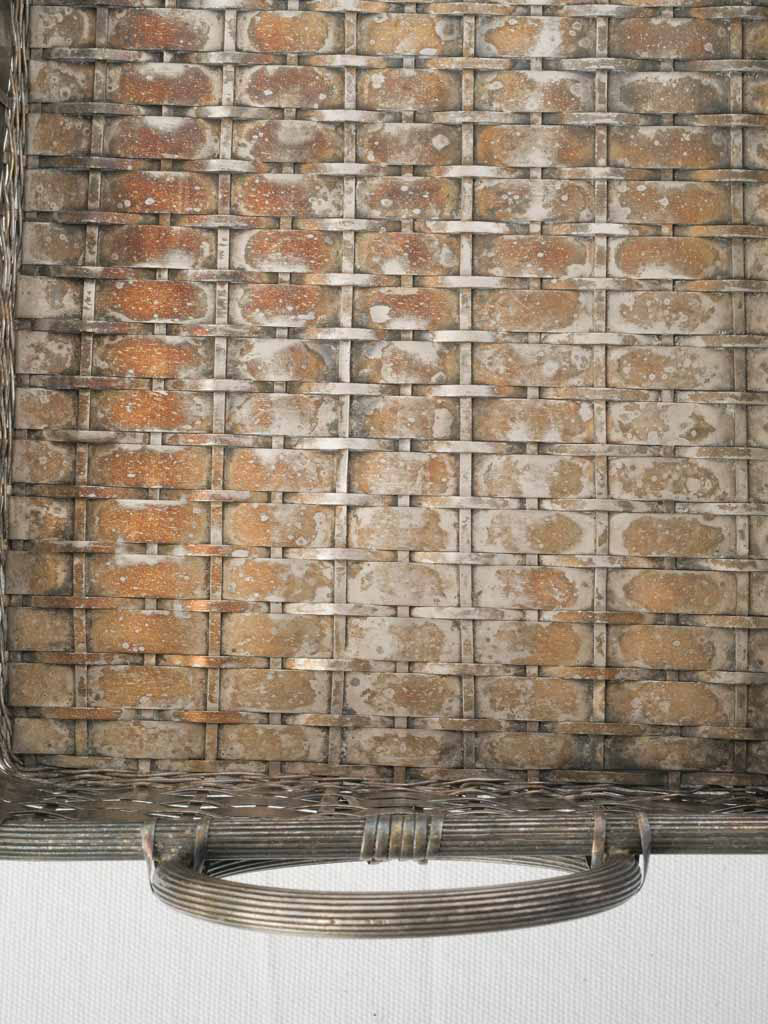 Sophisticated handwoven silvered basket.