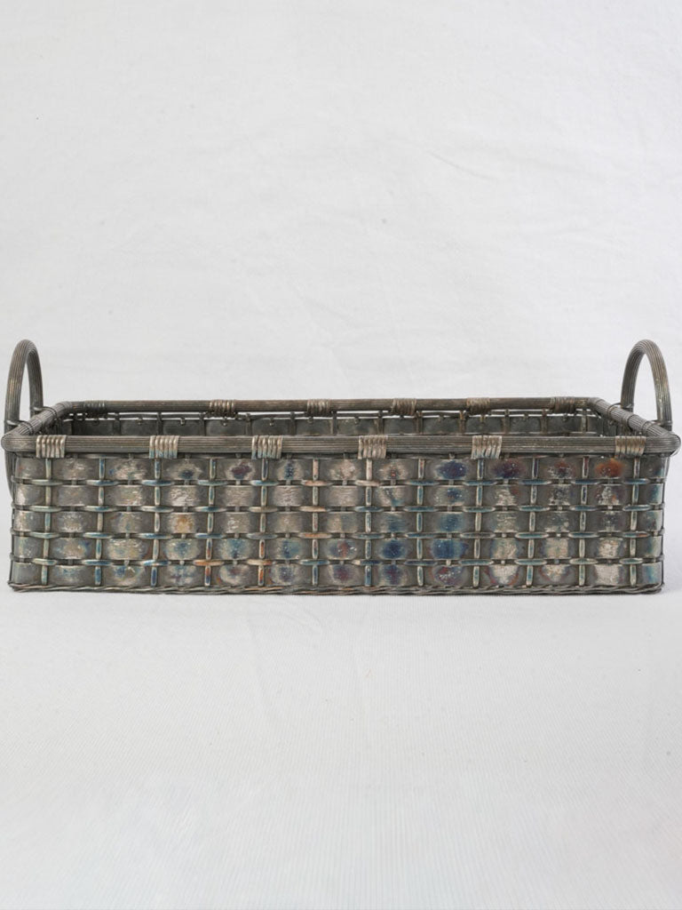 Aged silver low-profile tray basket.