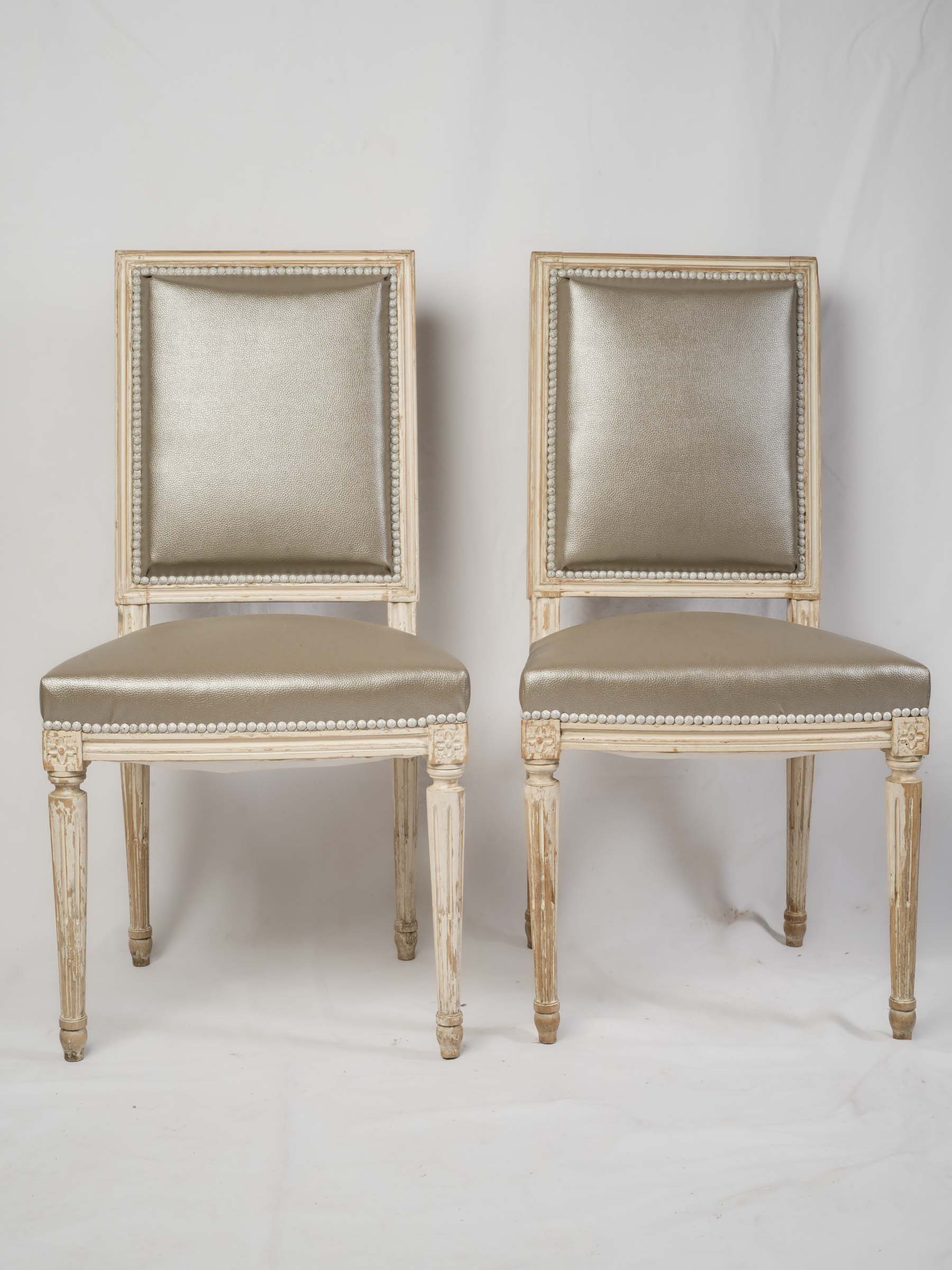 Suite of Eight French Louis XVI-Style Painted Dining Chairs, Early 20th Century