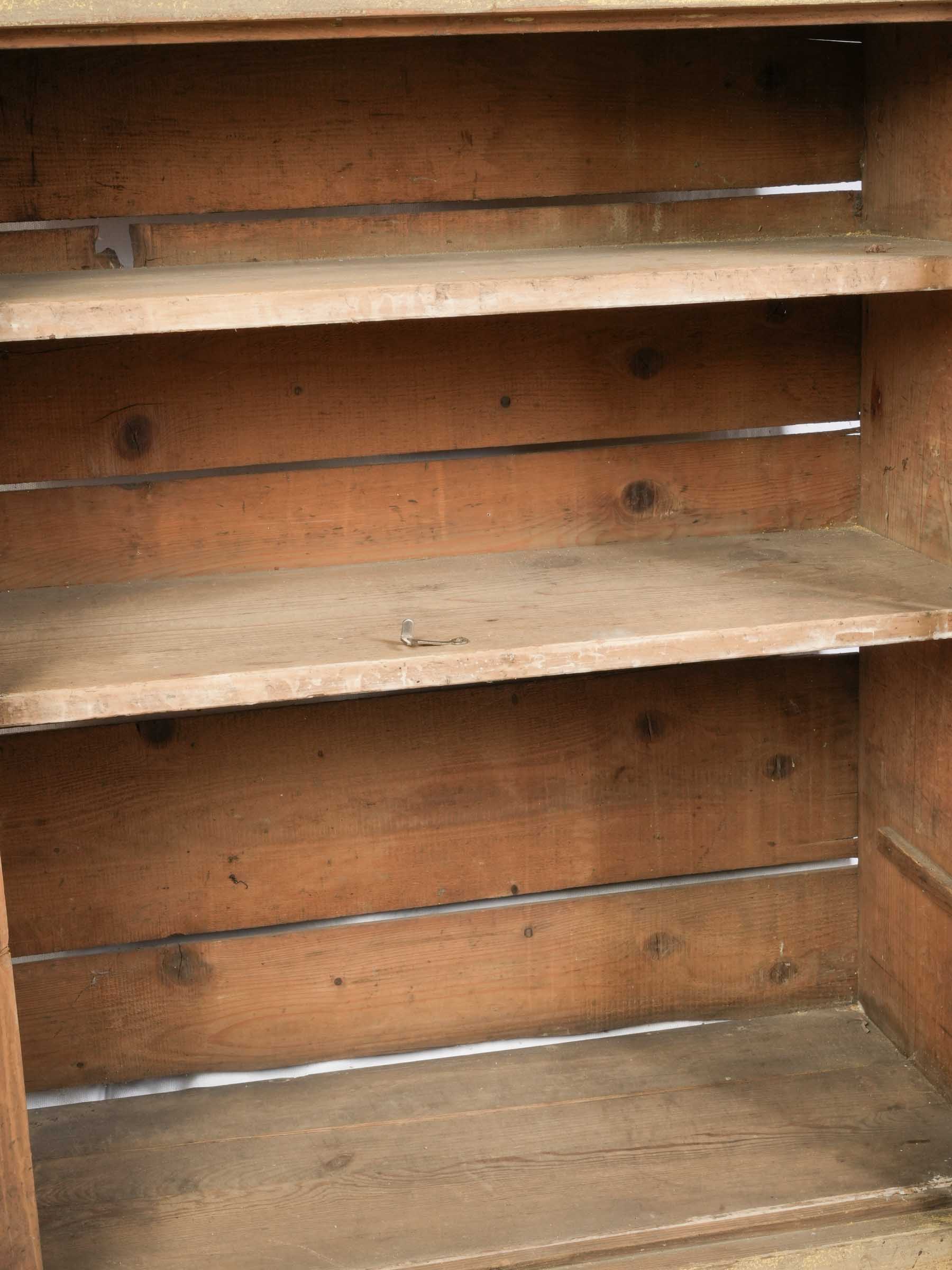 Patinated finish pantry cupboard
