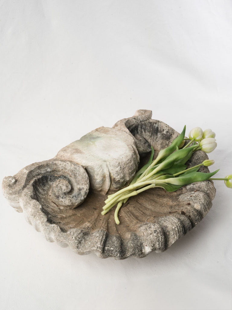 Weathered elegant garden sculpture