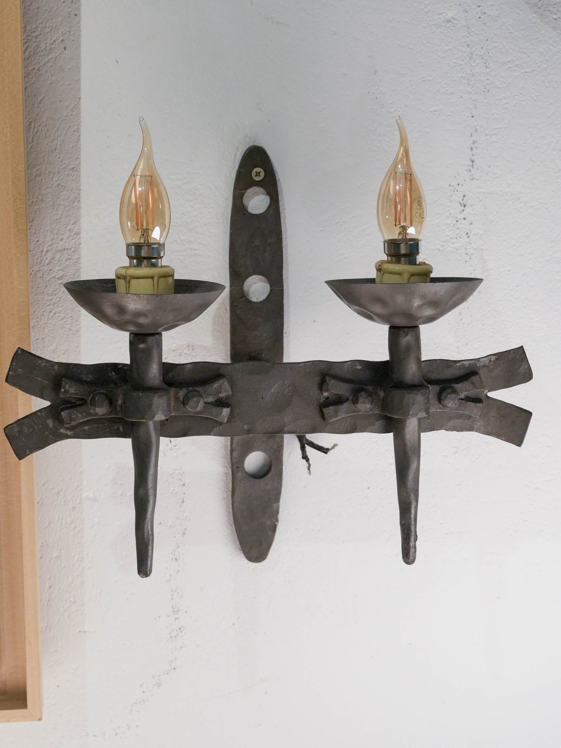 Gothic-style hand-forged iron sconces