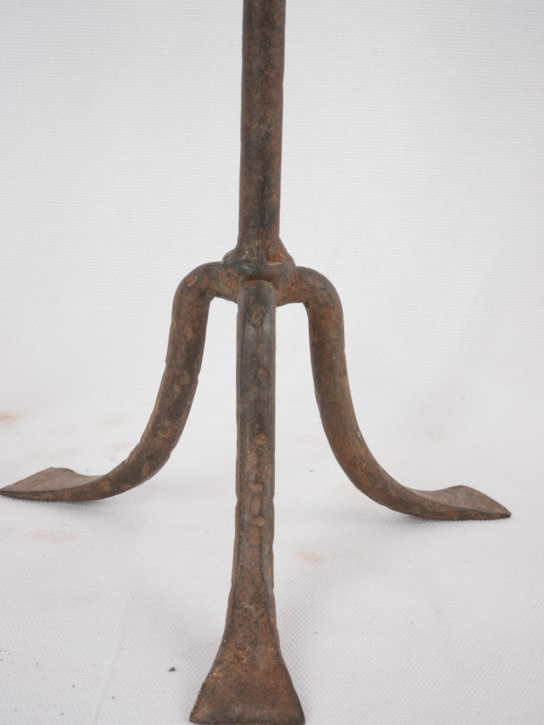 Weathered iron candlestick design