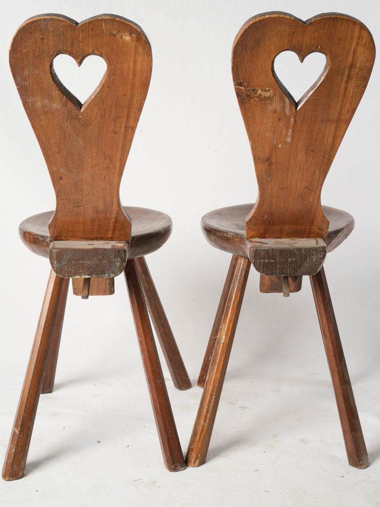 Elegant heart-motif wooden chairs